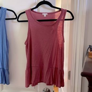 Mauve peplum top from the Gap. Size medium. Good condition.